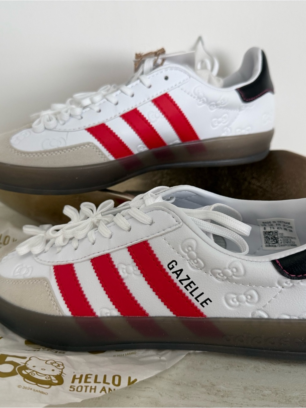 Gazelle White Red Low-Top Sneakers. It fits more like a 8 1/2. NO BOX